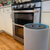 photo of air purifier for odors next to gas stove photo of air purifier for odors next to gas stove