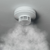 indoor smoke detector with smoke around it indoor smoke detector with smoke around it