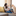 family with their dog on the couch