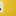 Cord plugged into an outlet on a yellow wall